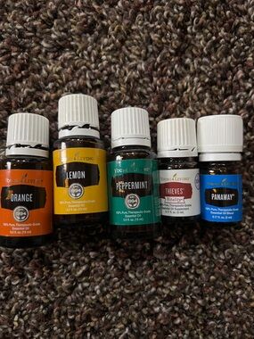 YL Essential Oils opened orange, Lemon. Sealed peppermint thieves panaway